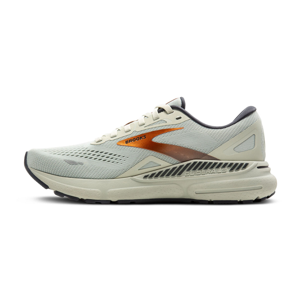 Women's Brooks Adrenaline GTS 23. Off white upper. Tan midsole. Medial view.