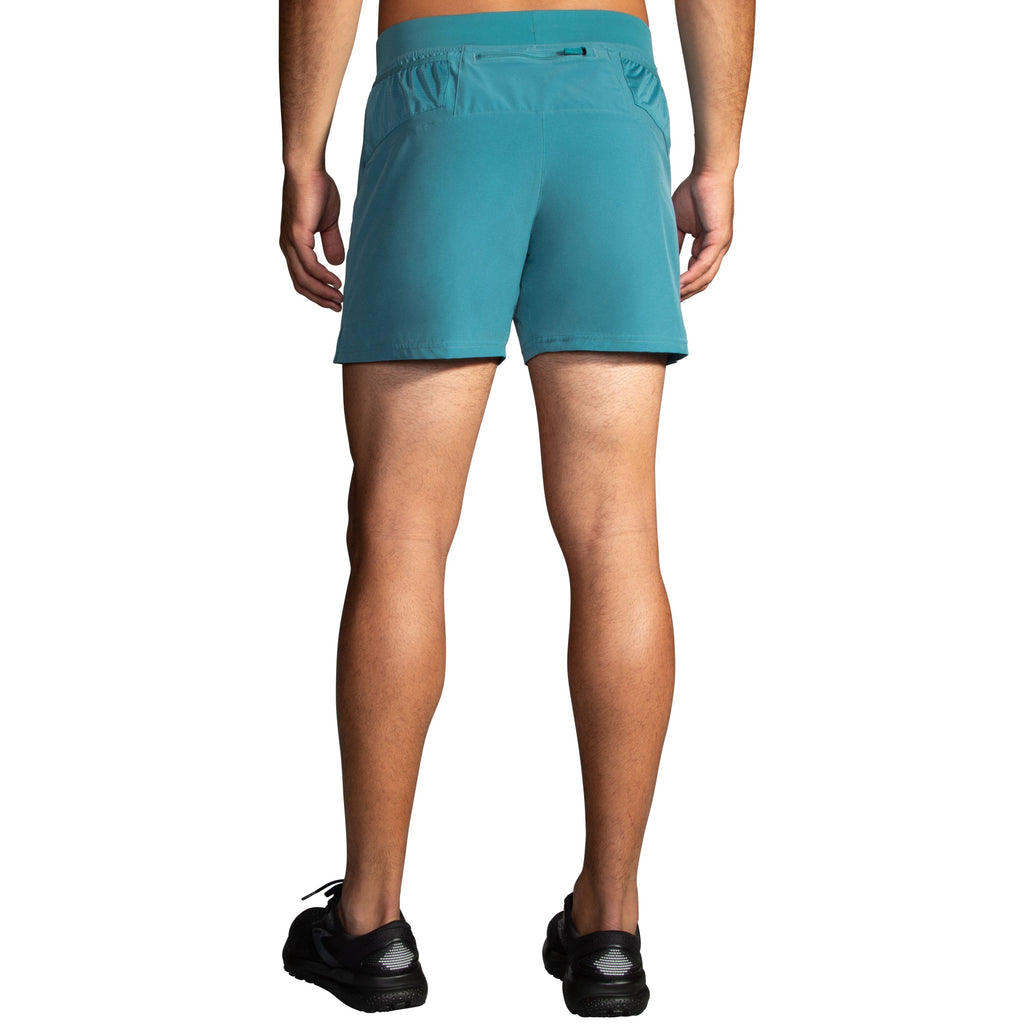 Men's Brooks Sherpa 5" Shorts. Blue/Green. Rear view.