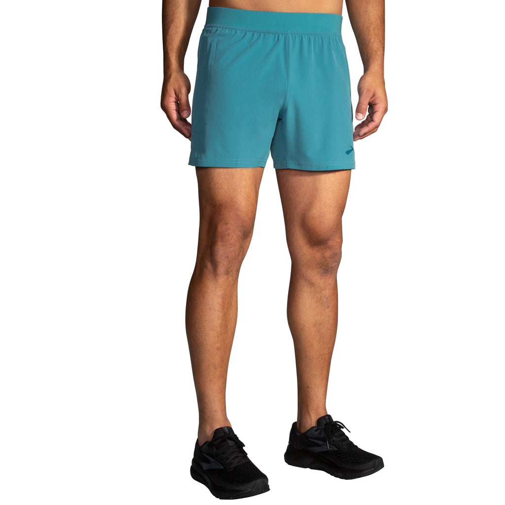 Men's Brooks Sherpa 5" Shorts. Blue/Green. Front view.