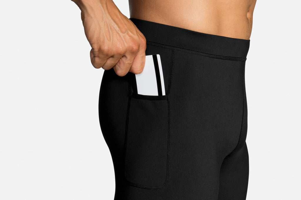 Men's Brooks Source Tights. Black. Lateral view.