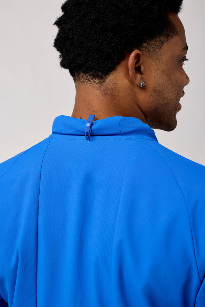 Men's Brooks Canopy Jacket. Blue. Rear view.