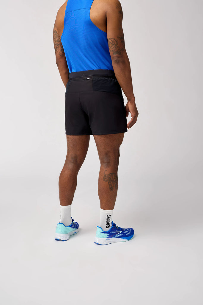 Men's Brooks Journey Shorts. Black. Rear/Lateral view.