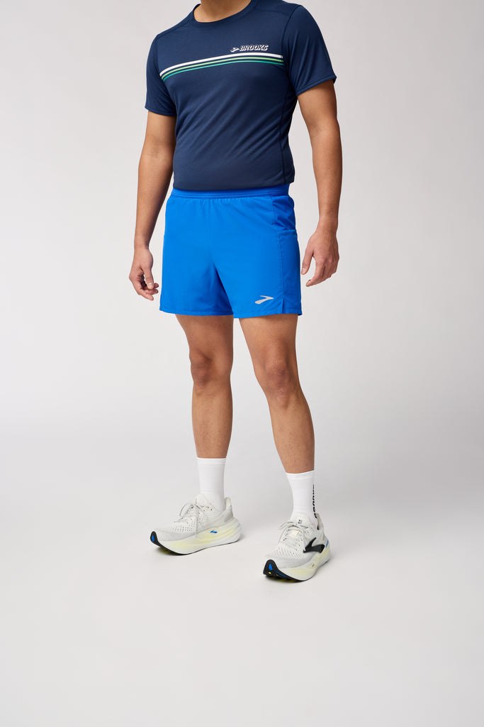 Men's Brooks Journey Shorts. Blue. Front view.