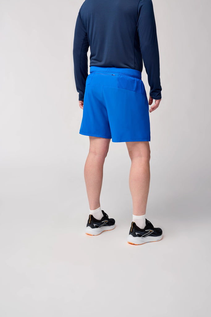 Men's Brooks Journey 7" Shorts. Blue. Rear/Lateral view.