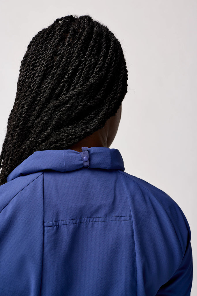 Women's Brooks Canopy Jacket. Dark Blue. Rear view.