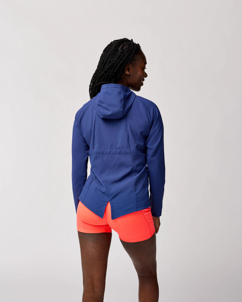 Women's Brooks Canopy Jacket. Dark Blue. Rear view.