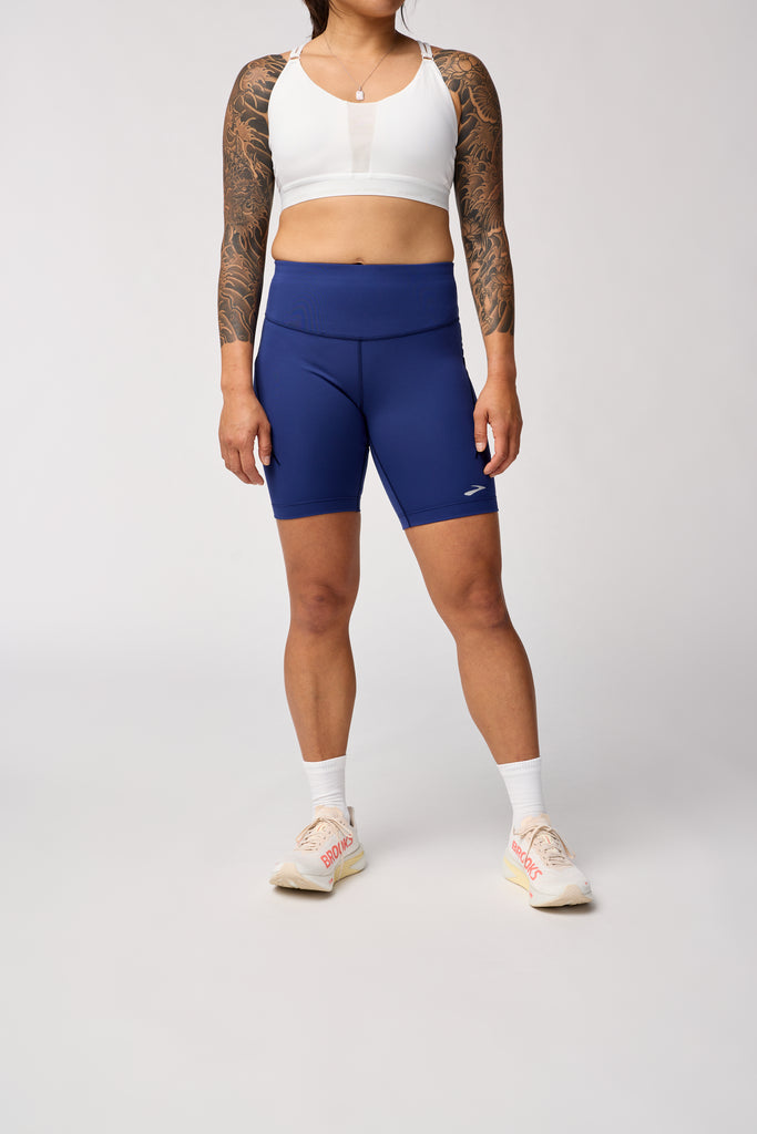 Women's Brooks Spark 8" Short Tights. Dark Blue. Front view.