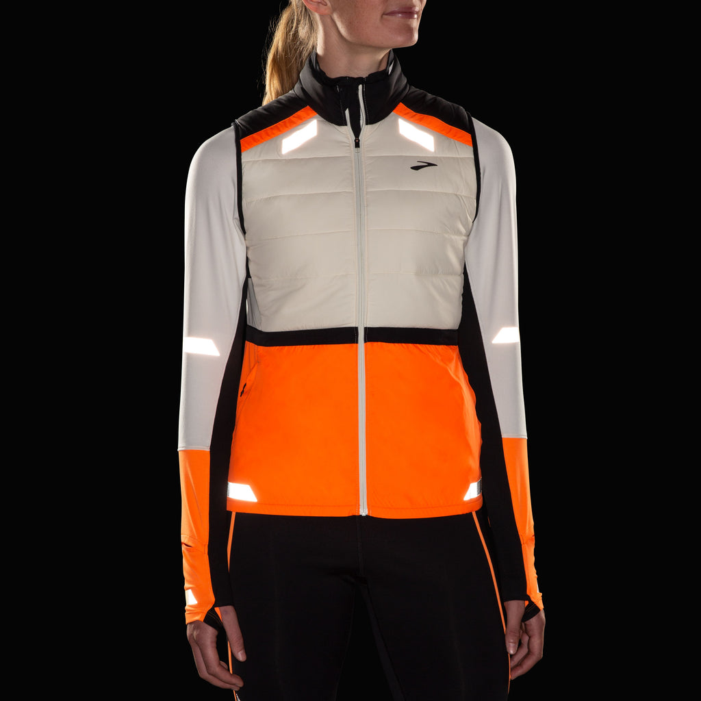 Women's Brooks Run Visible Insulated Vest 2.0. White/Black/Orange. Front view.