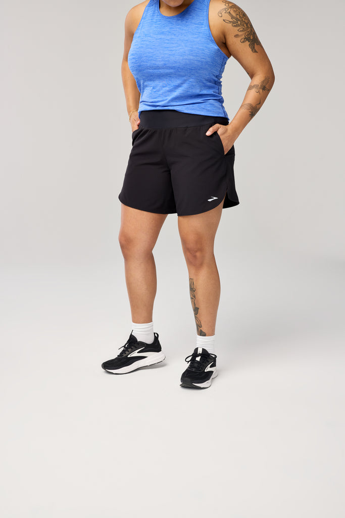 Women's Brooks Chaser 7" Shorts. Black. Front view.