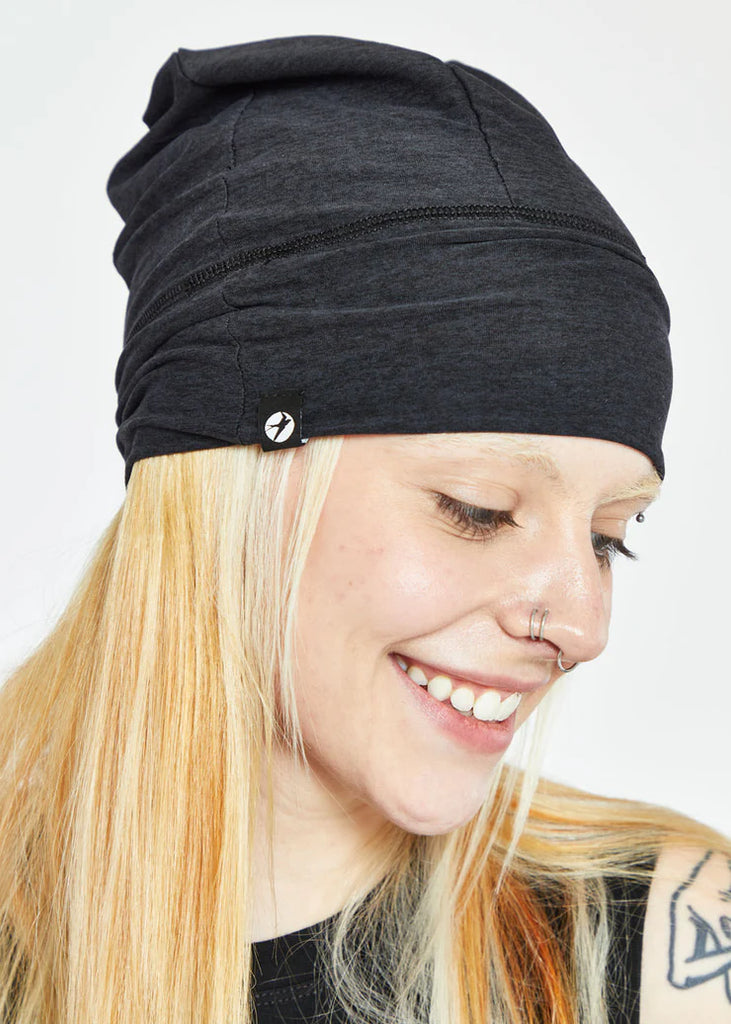 Women's Oiselle Lux Beanie. Black. Lateral view.