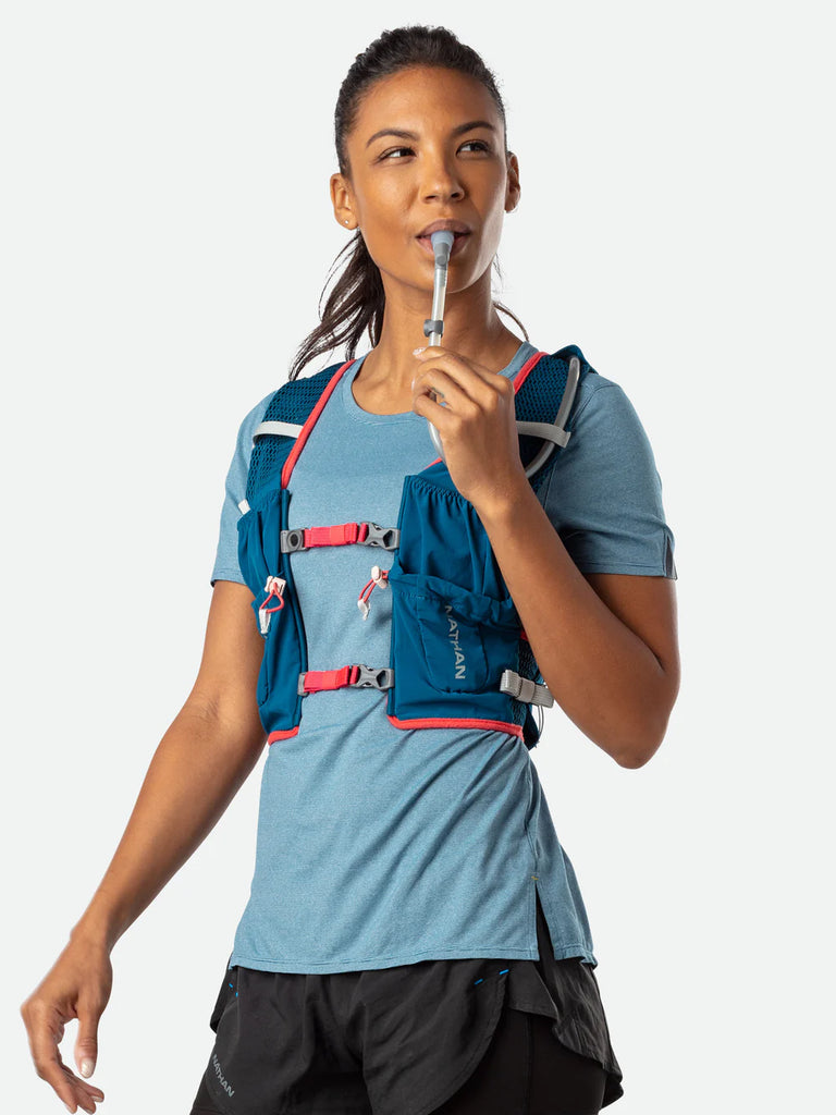 Women's Nathan VaporAiress Lite 4 Liter Hydration Vest. Blue. Front view.