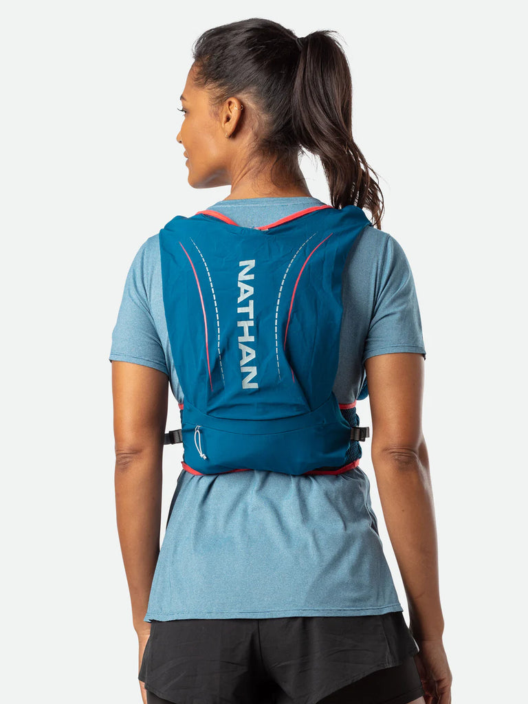 Women's Nathan VaporAiress Lite 4 Liter Hydration Vest. Blue. Rear view.