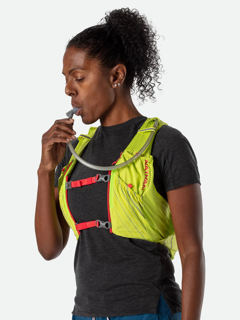 Women's Nathan Pinnacle 12L Hydration Vest. Yellow.