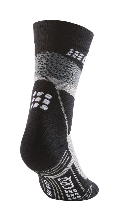 Women's CEP Max Cushion Mid Cut Socks. Black. Rear/Lateral view.