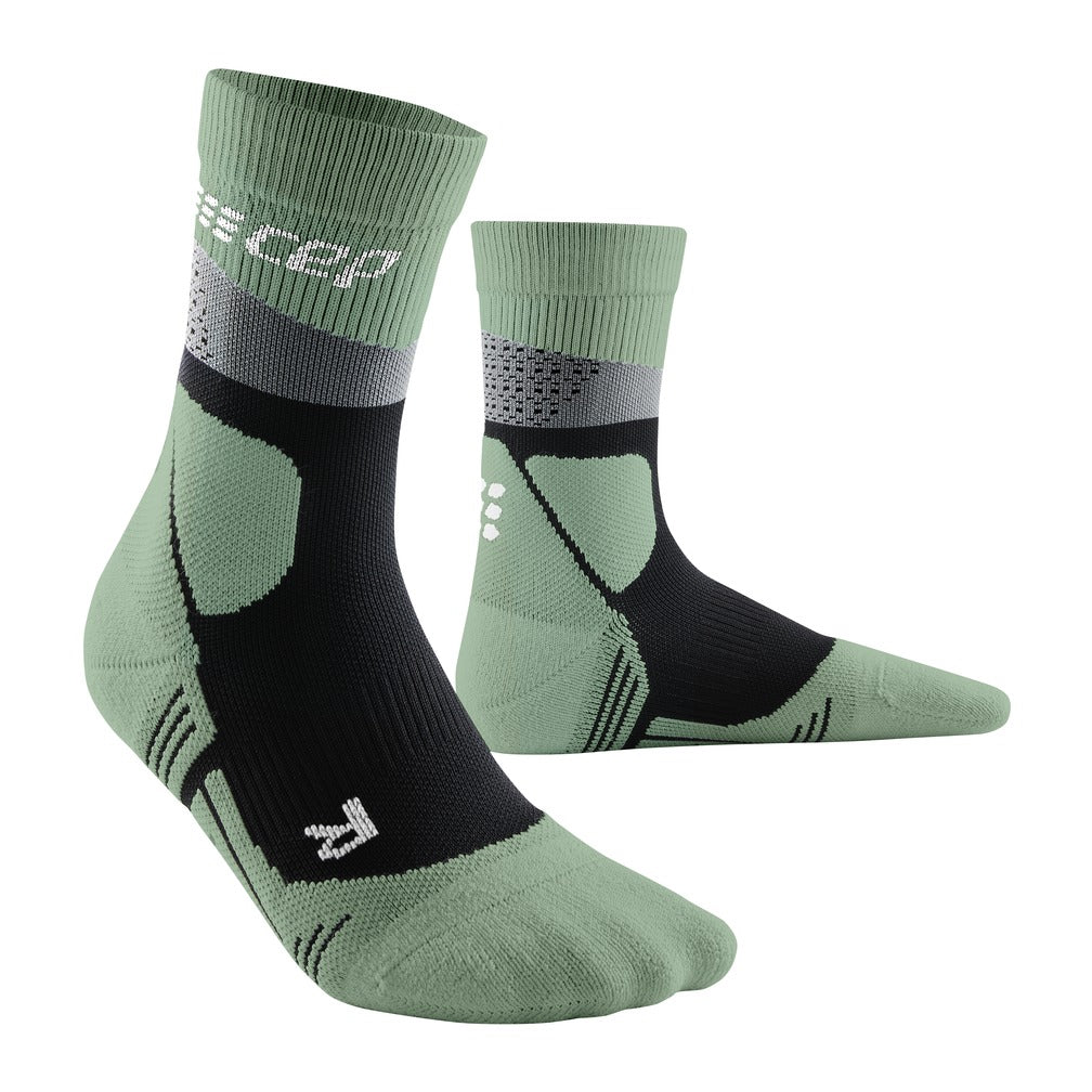 Men's CEP Max Cushion Mid Compression Socks. Green. Lateral view.