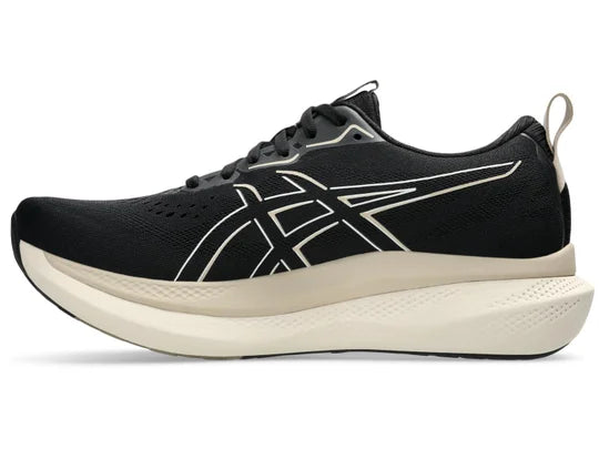 Men's Asics GlideRide Max. Black upper. Off White midsole. Medial view.