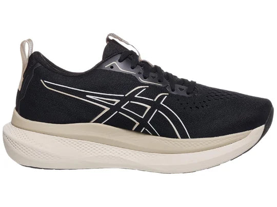 Men's Asics GlideRide Max. Black upper. Off White midsole. Medial view.