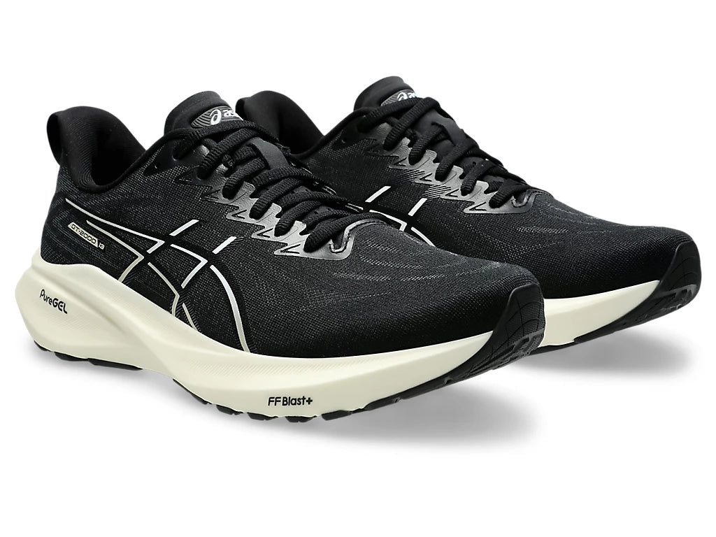 Men's Asics GT 2000 13. Black upper. White midsole. Lateral view.