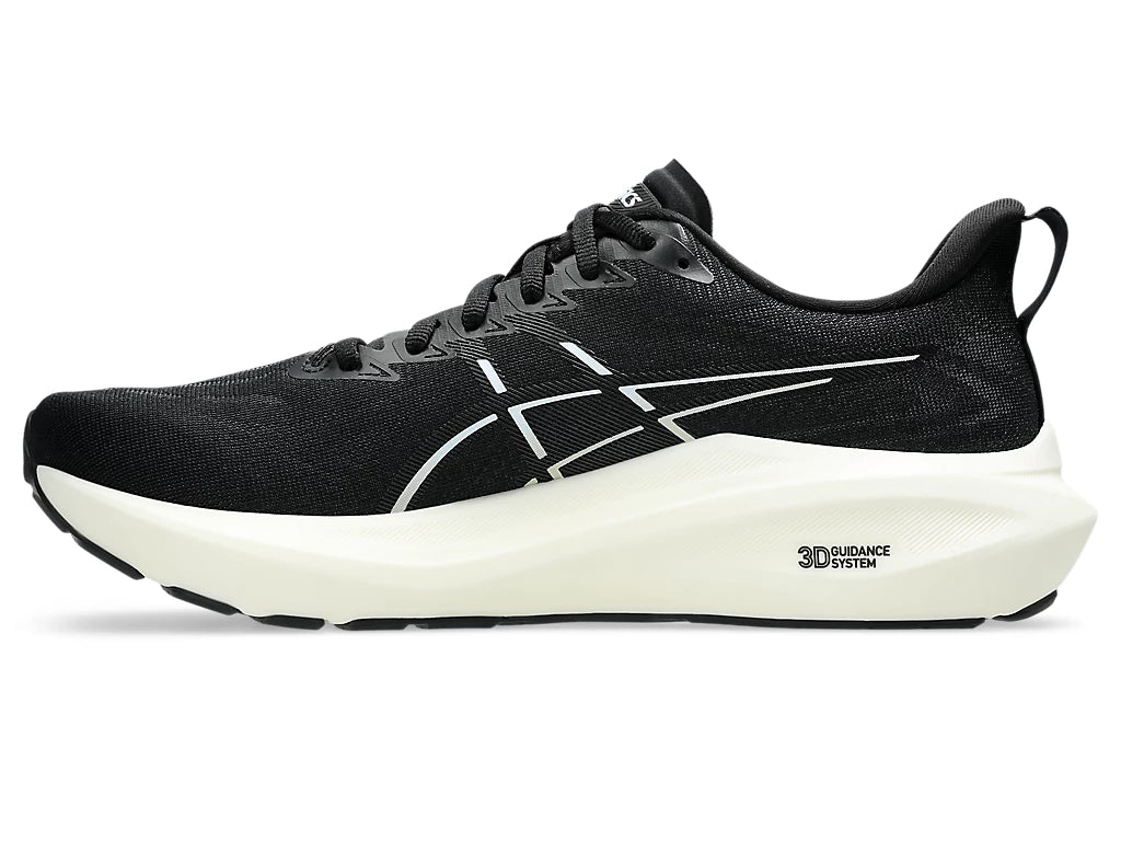 Men's Asics GT 2000 13. Black upper. White midsole. Medial view.