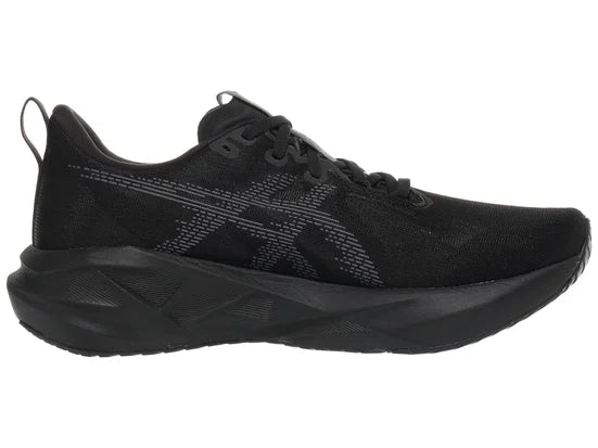 Men's Asics Novablast 5. Black upper. Black midsole. Medial view.