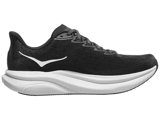 Men's Hoka Mach 6. Black upper. White midsole. Medial view.