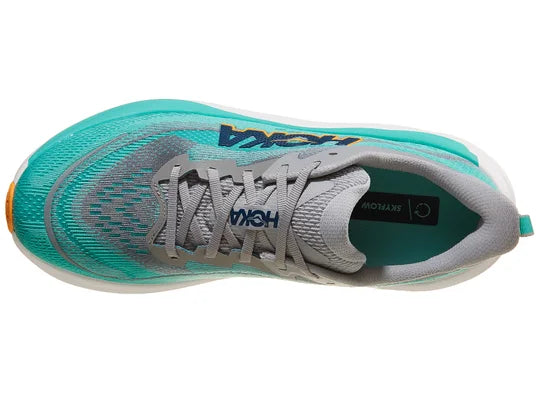 Men's Hoka Skyflow. Green upper. White midsole. Top view.