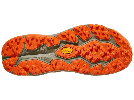 Men's Hoka Speedgoat 6. Brown upper. Green midsole. Bottom view.