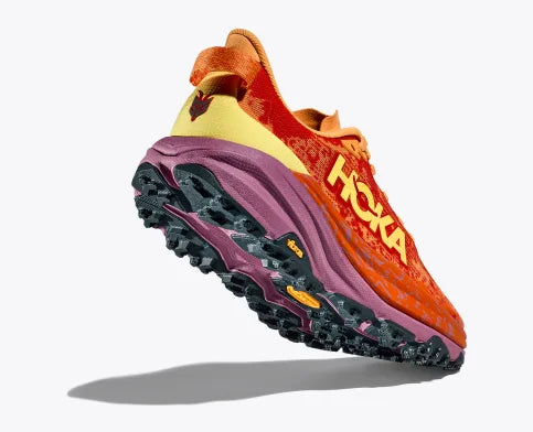 Men's Hoka Speedgoat 6. Red upper. Red/Purple midsole. Rear/Lateral view.