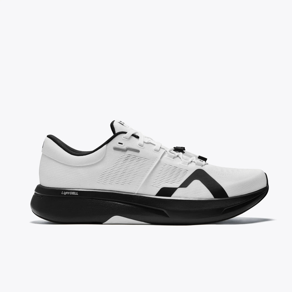 Men's Mount to Coast. R1. White upper. Black midsole. Lateral view.
