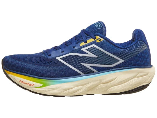 Men's New Balance 1080 v14. Blue upper. Off White midsole. Lateral view.