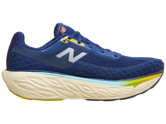 Men's New Balance 1080 v14. Blue upper. Off White midsole. Medial view.