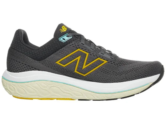 Men's New Balance Fresh Foam X 860v14. Dark grey upper. White midsole. Medial view.