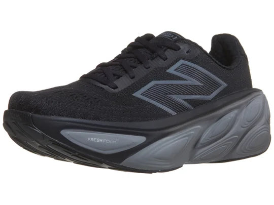 Men's New Balance Fresh Foam X More v5. Black upper. Grey midsole. Lateral view.