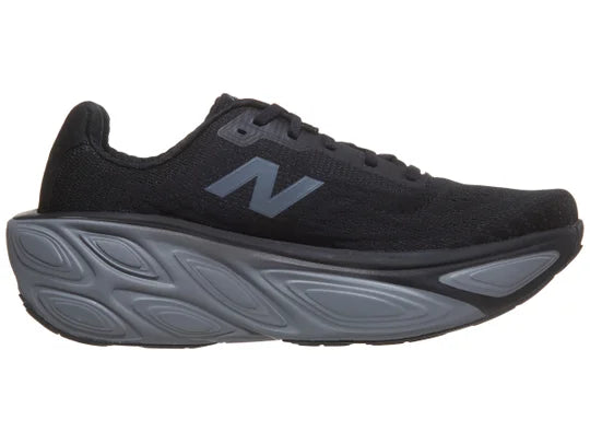 Men's New Balance Fresh Foam X More v5. Black upper. Grey midsole. Medial view.