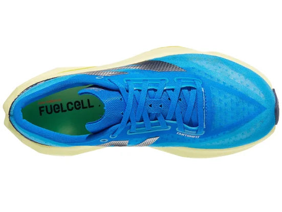Men's New Balance FuelCell Rebel v4. Blue upper. Green midsole. Top view.