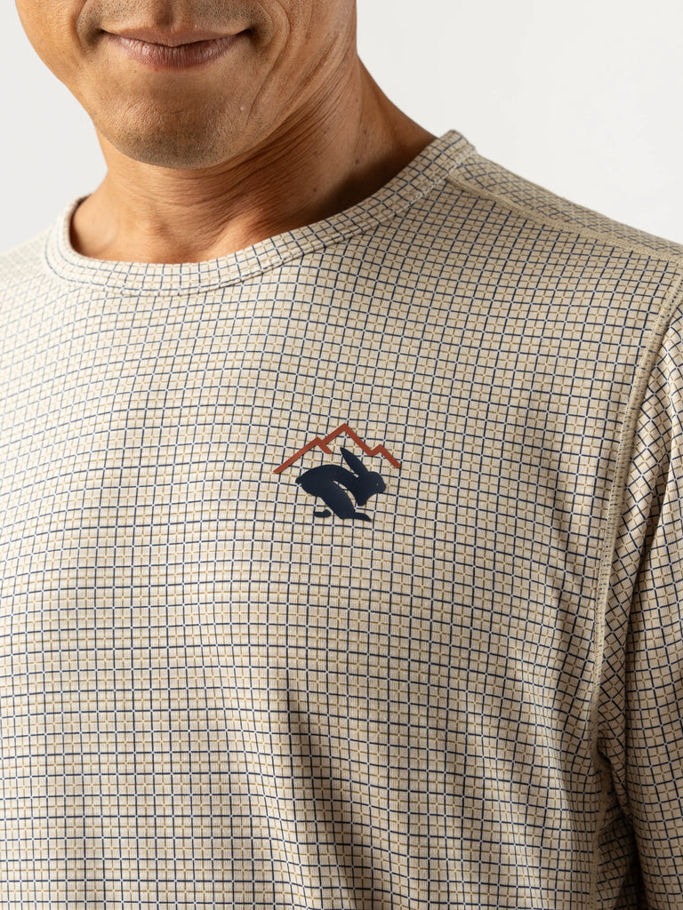 Men's rabbit Layer One Trail Long Sleeve. Light Tan/Plaid. Front view.