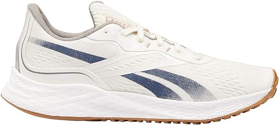 Men's Reebok Floatride Energy Grow. White upper. White midsole. Lateral view.