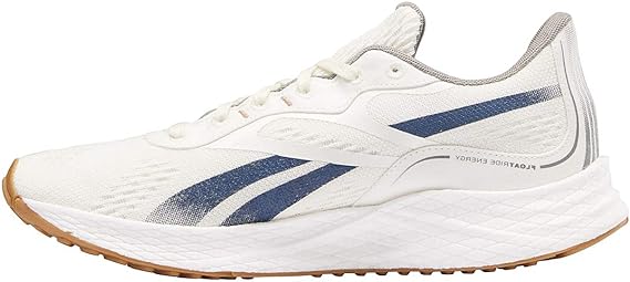 Men's Reebok Floatride Energy Grow. White upper. White midsole. Medial view.