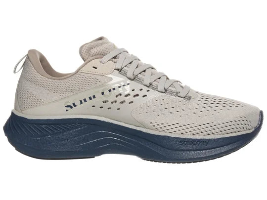 Men's Saucony Ride 17. Grey upper. Blue midsole. Medial view.