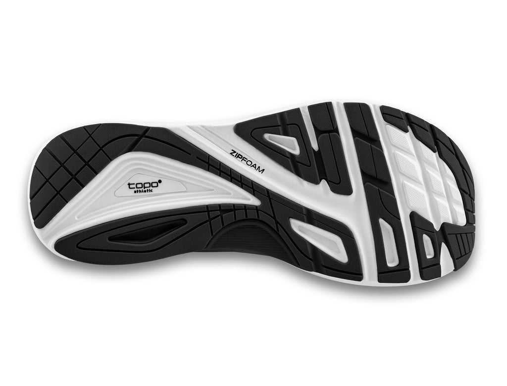 Men's Topo Athletic Ultrafly 4. Black upper. White midsole. Bottom view.