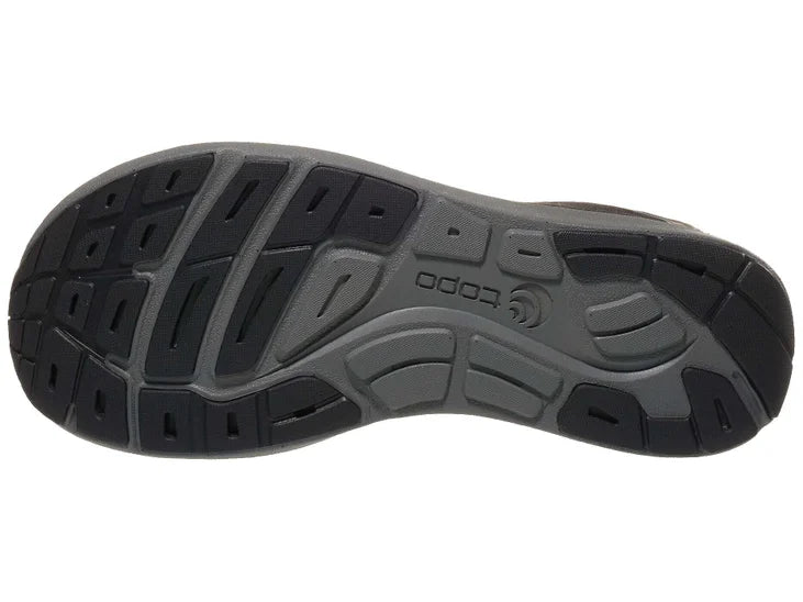 Men's Topo Athletic ST-5. Black upper. Dark grey midsole. Bottom view.