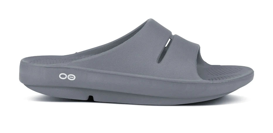 Oofos Ooahh Slide. Gray. Lateral view.