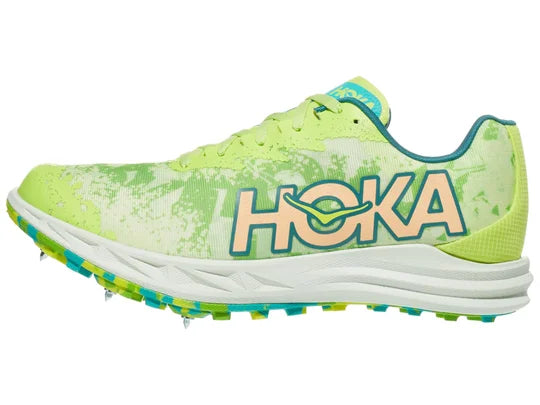 Unisex Hoka Crescendo XC Spike. Green upper. White midsole. Lateral view.