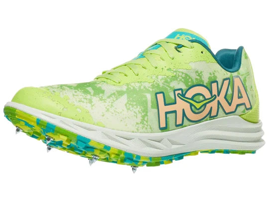 Unisex Hoka Crescendo XC Spike. Green upper. White midsole. Lateral view.