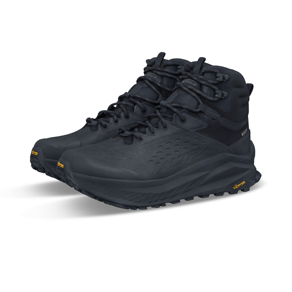 Women's Altra Olympus 6 hike MID GTX. Black upper. Black midsole. Lateral view.