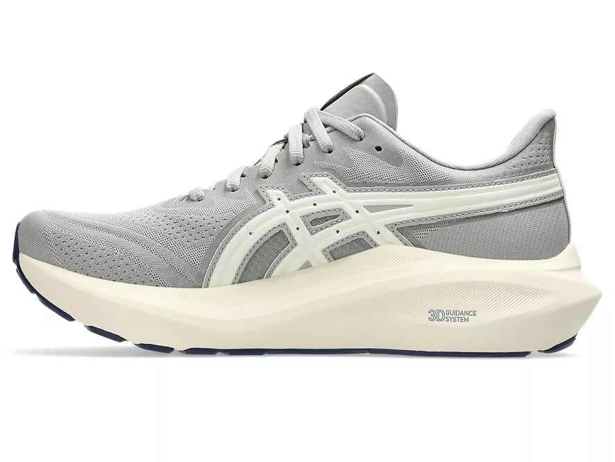 Women's Asics GT-2000 13. Grey upper. Off White midsole. Medial view.