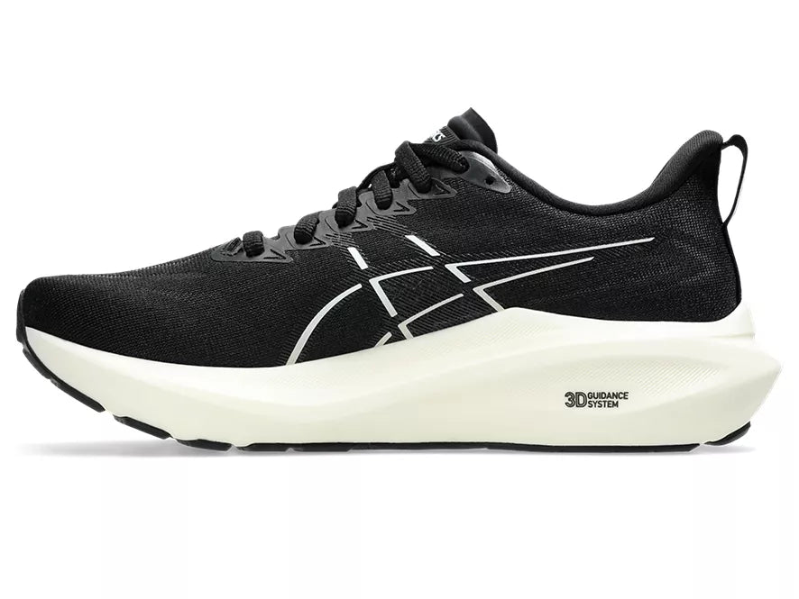 Women's Asics GT-2000 13. Black upper. White midsole. Medial view.