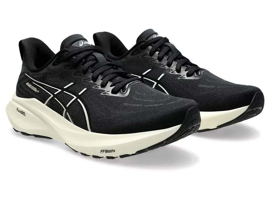 Women's Asics GT-2000 13. Black upper. White midsole. Lateral view.