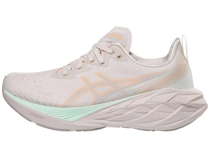 Women's Asics Novablast 4. White upper. White midsole. Lateral view.