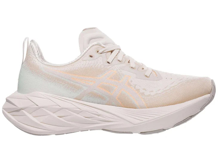 Women's Asics Novablast 4. White upper. White midsole. Medial view.